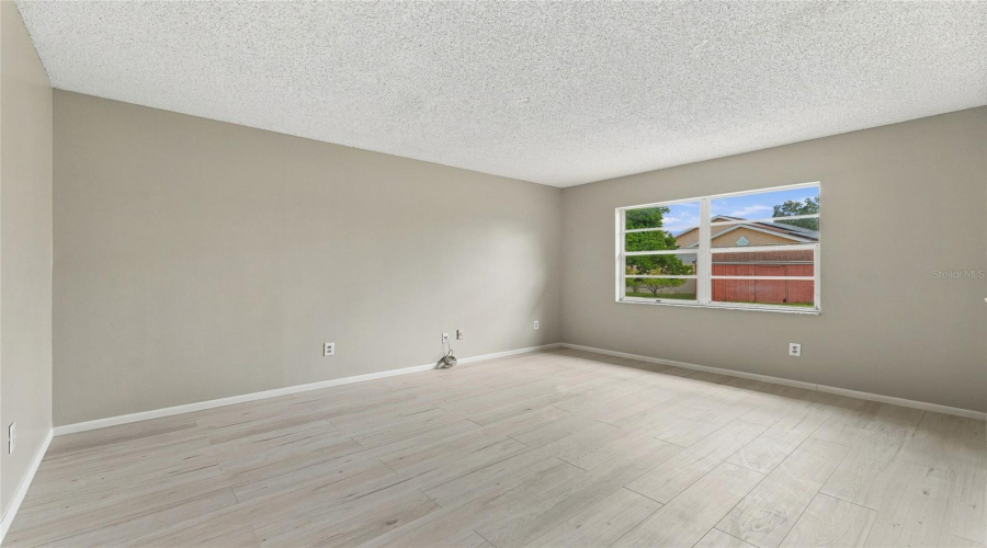 Neutral-Toned Walls Complement Wood-Finish Flooring