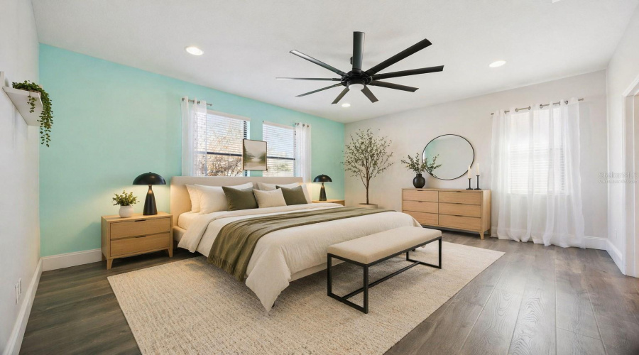 Virtually Staged Primary Bedroom Located On The First Floor