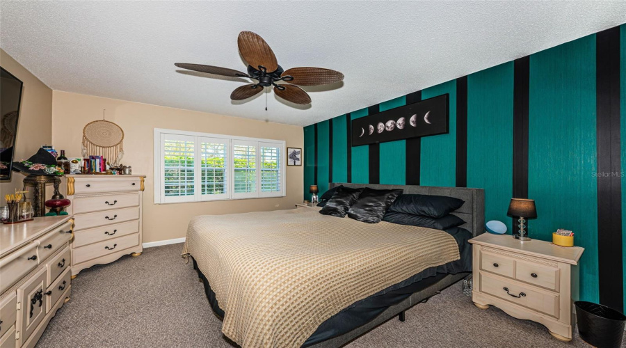 Large Primary Bedroom With Custom Wall Accents.