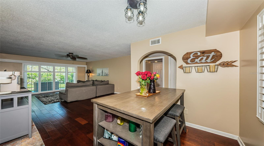 Dedicated Dining Area Leading To Living Room.