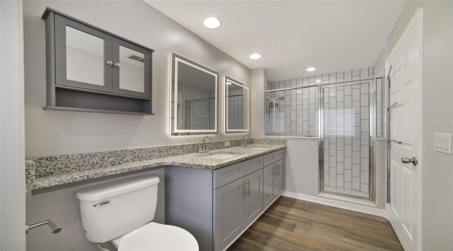 The Private En-Suite Bath Is Complete With Dual Sinks And A Step-In Shower.