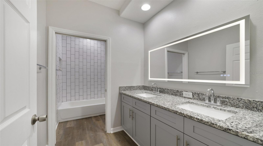 Two Additional Bedrooms Share The Second Updated Full Bath, Providing Comfortable Space For Family, Guests Or A Home Office.