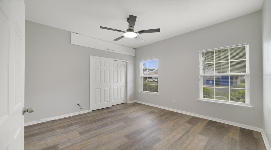 All Three Bedrooms And Both Updated Bathrooms Feature Stylish Luxury Vinyl Plank Flooring.