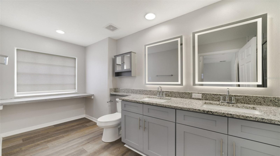 The Private En-Suite Bath Is Complete With Dual Sinks And A Step-In Shower.