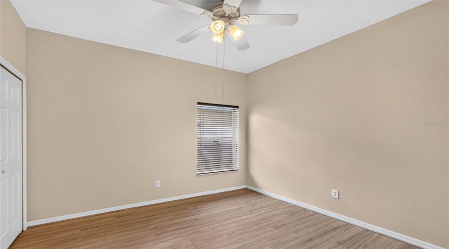 Guest Room With Full Bath At The Back Of The Home.