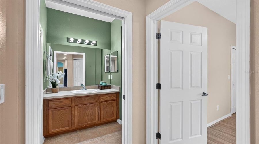 Guest Room With Full Bath At The Back Of The Home.