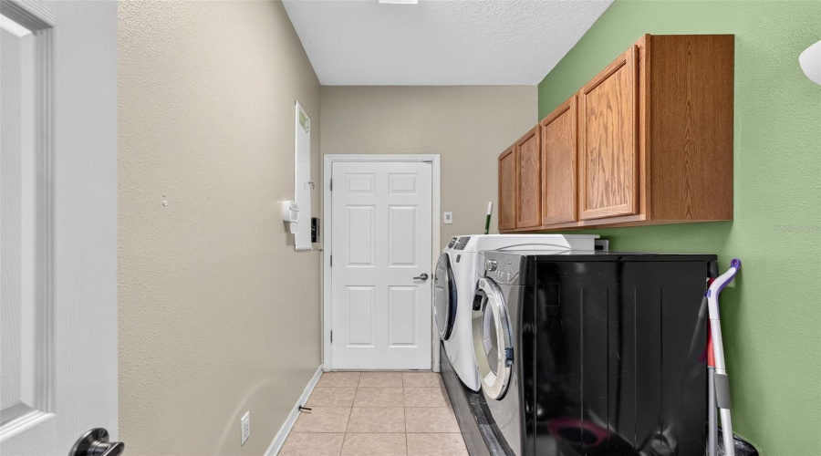 Laundry Leading To 3 Car Garage