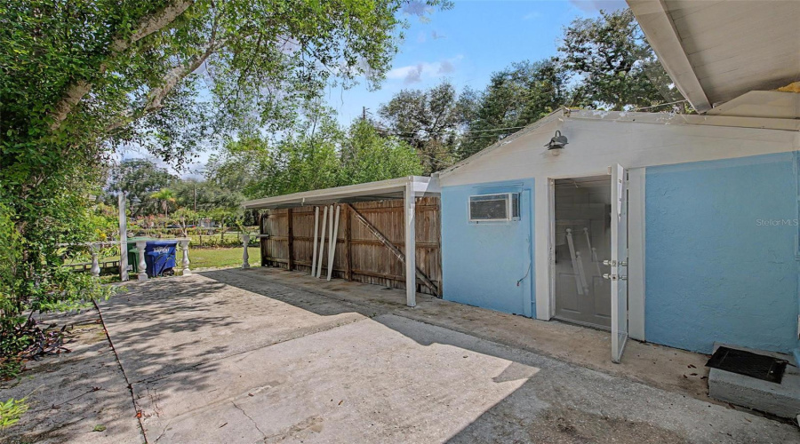 West Side Outside Storage And Laundry Room
