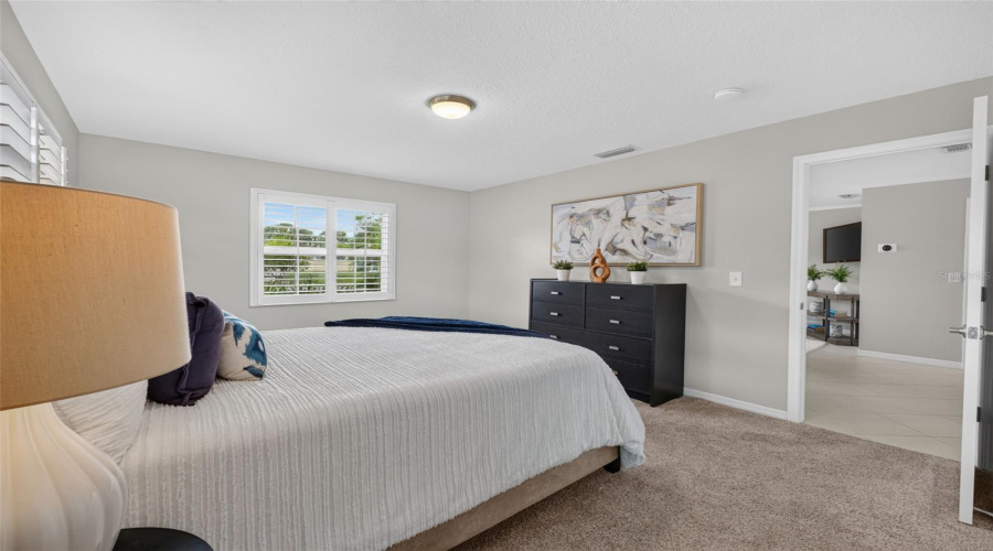Primary Bedroom W/ Plantation Shutters