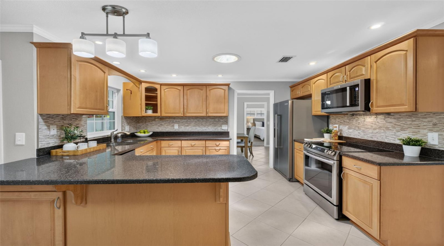 Renovated Kitchen With Stainless Steel Appliances