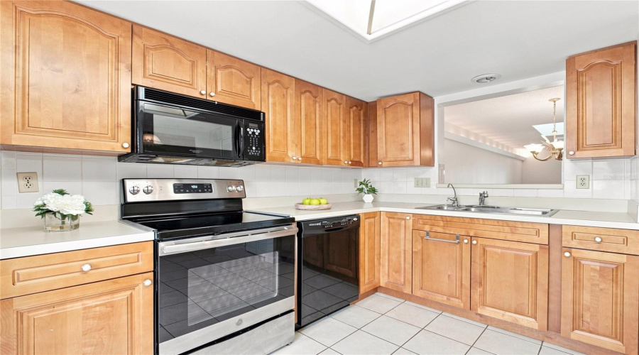 Spacious Kitchen With Updated Cabinetry &Amp; Convenient Pass-Through Window To The Main Living~