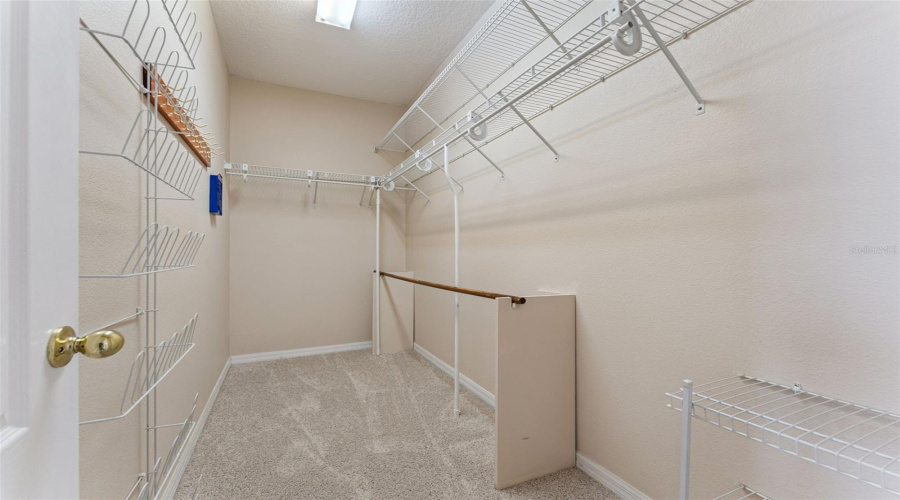 Primary Suite Walk-In Closet.