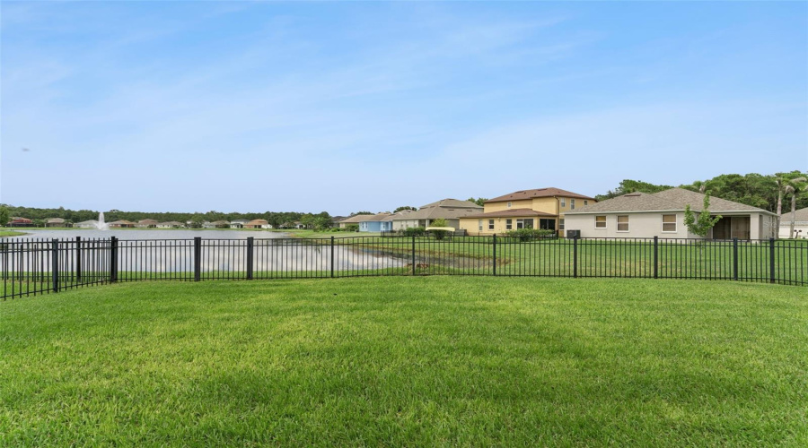 Enjoy Pond Views From Your Enclosed Lanai.