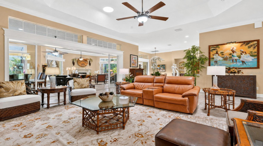 Another Wide Angle View Of The Living Room - Shifts Your Perception Of The Sheer Size Of This Living Room Space! Note The Background Locations Of The Gathering Room (L Side) Beyond The Sliding Glass Doors And The Breakfast Nook (Back L).