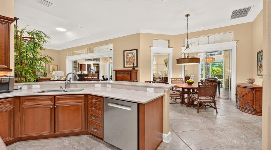 Kitchen - View From The Island Shows The Open Connection To Breakfast Nook That Keeps The Kitchen As The Central Hub Between Living And Dining Spaces.
