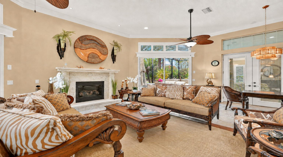Gathering Room - Another View Of The Cozy &Amp; Casual Tommy Bahama Home Seating Arrangement Around The Fireplace.