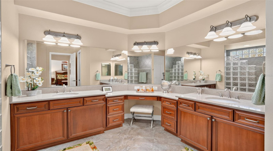 Primary Ensuite Bath - Dual-Sink Vanities With Quartz Counters, Wall-To-Wall Mirrors, Plus A Makeup Area Between The Vanities.