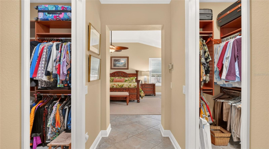 Primary Br Dual Closets - Hallway View Of The Large Dual Closets W/ Upgraded California Organization Systems.