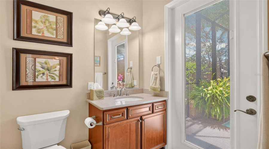 Ensuite Bathroom (Ba #3) - Single-Sink Vanity W/ Quartz Countertop, Comfort Height Toilet Plus An Exterior Glass Door W/ Built-In Blinds Allowing Natural Light/Privacy And Access To The Pool Area.