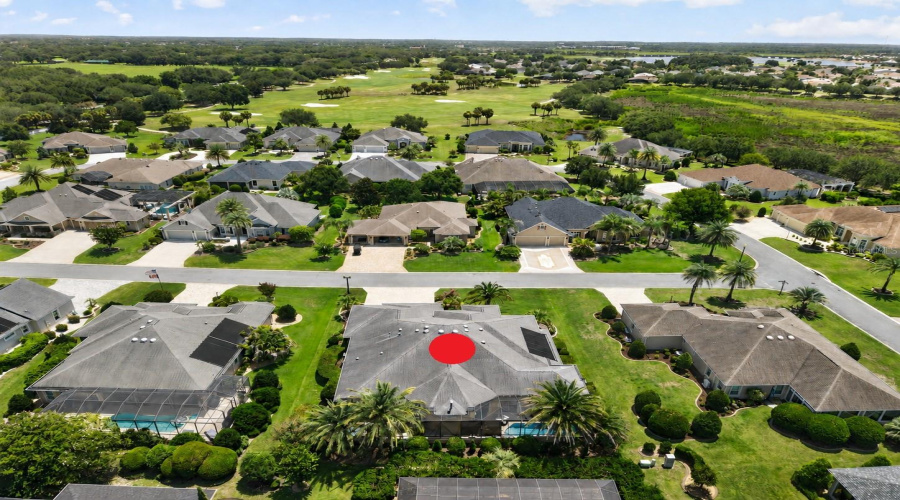 Aerial – Looking East – Palmer Legends’ Riley Grove Nine Stretches Across The View, With Cr 466 To The Left And The Tip Of Lake Sumter Landing Visible To The Right.