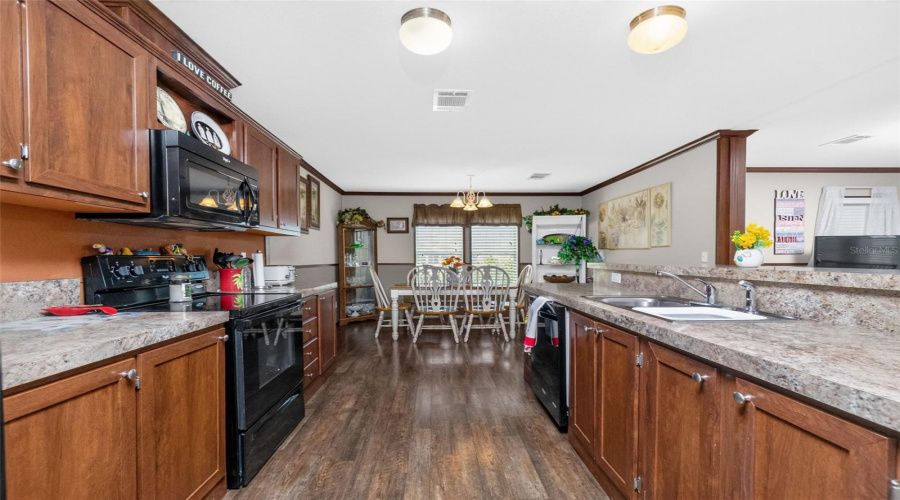 Spacious Galley Kitchen Is Open To The Living Room
