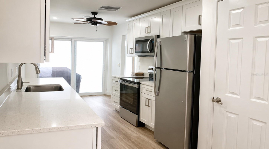 View Of Kitchen With Closet Pantry