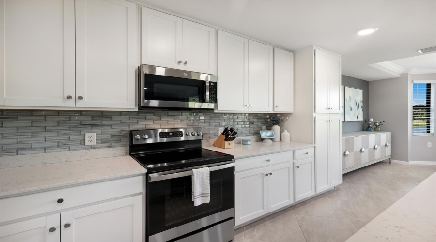 New Glass Backsplash And Tons Of Cabinet Storage