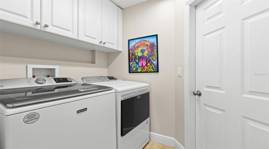 Laundry Room With Access To One-Car Garage