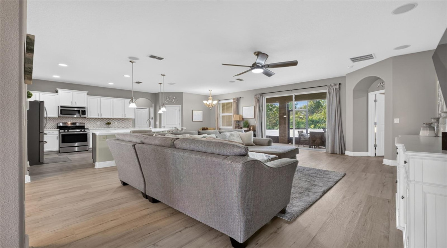 Open Living Area Towards The Screened Lanai And Kitchen