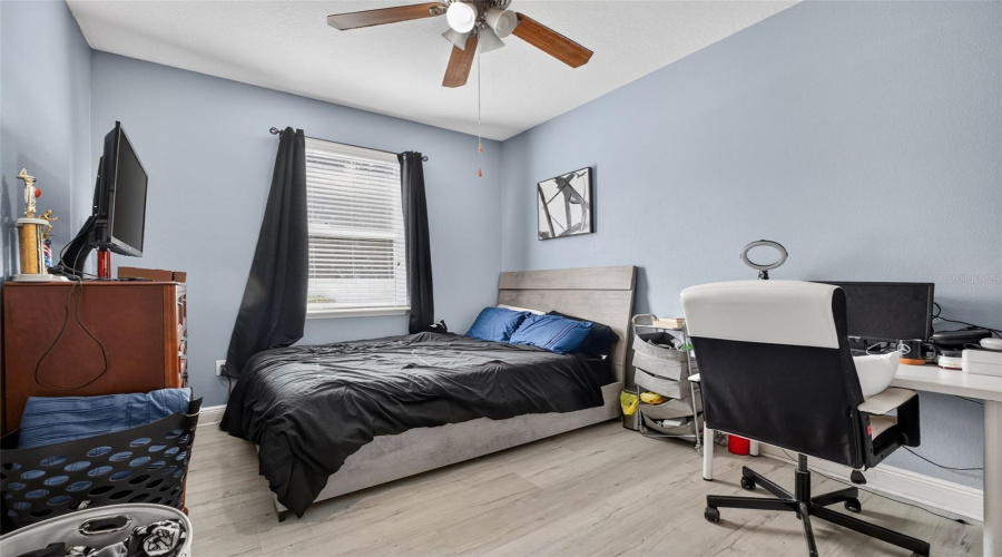 Second Bedroom With Ceiling Fan And Built-In-Closet