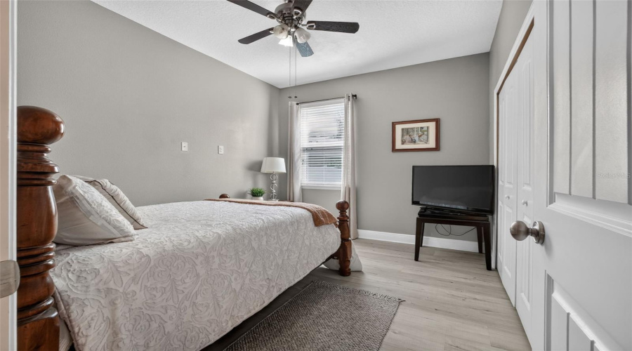 Third Bedroom With Built-In-Closets And Ceiling Fan