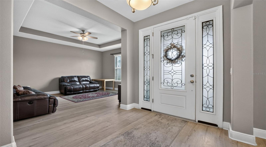 Foyer Towards Spacious Bonus Room W/Tray Ceiling.