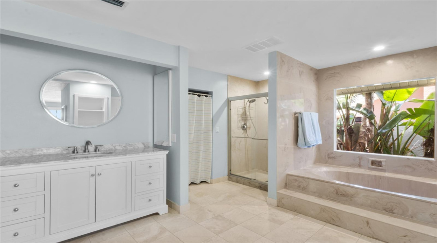 The Primary Bathroom Houses 2 Walk In Closets And 1 Large Storage Area.