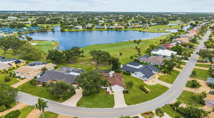 Set Far Enough From The Golf Course And With Mature Trees Providing A Buffer, Privacy Is Maintained With This Peaceful View!