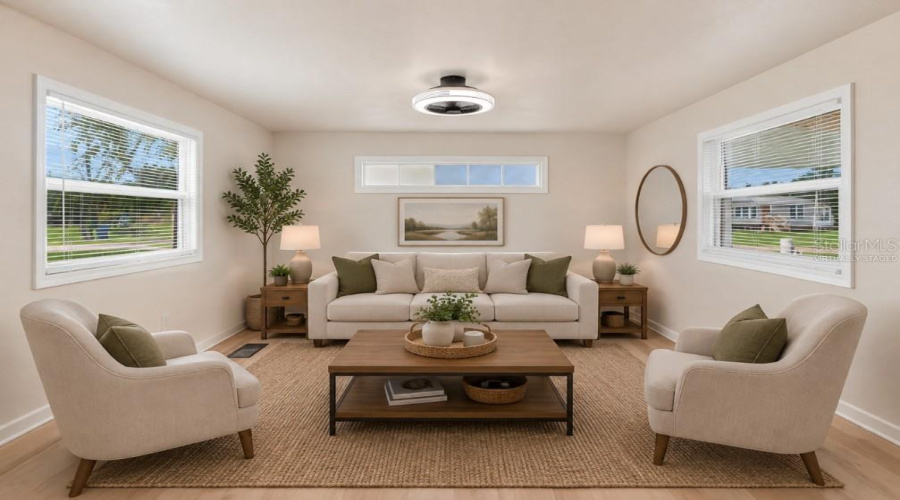 Virtually Staged...completely Remodeled! ..Living Room W/ New Luxury Vinyl Planking &Amp; New Ceiling Fan/Lighting Fixture