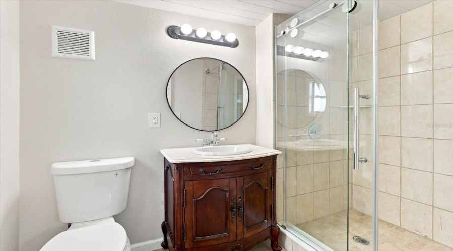 Updated Master Bathroom W/ Center Flush Toilet