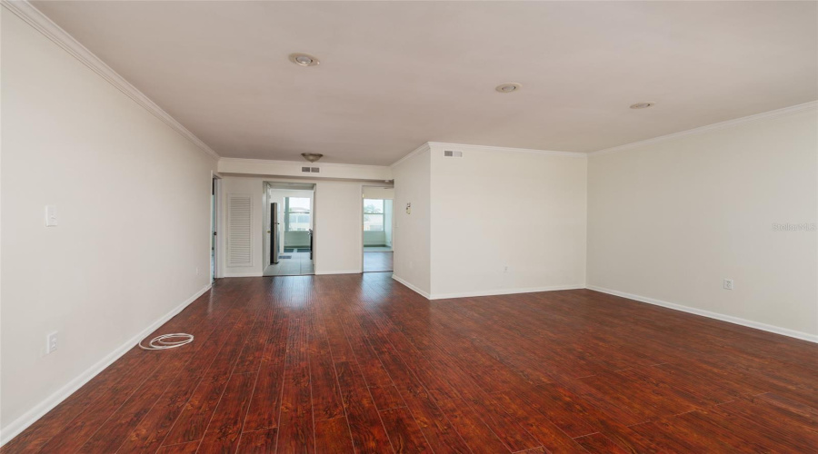 Living &Amp; Dining Areas: High End Laminate Flooring &Amp; Crown Molding.
