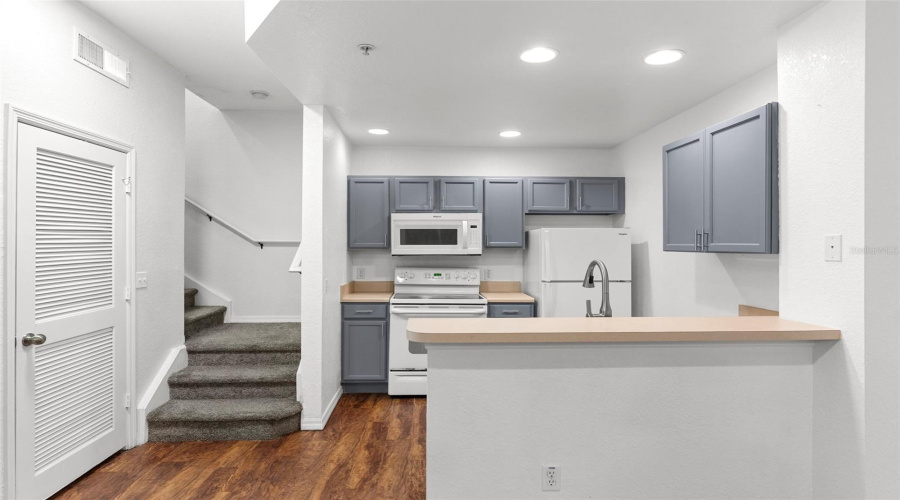 Additional View Of Kitchen And Stairs To Second Floor