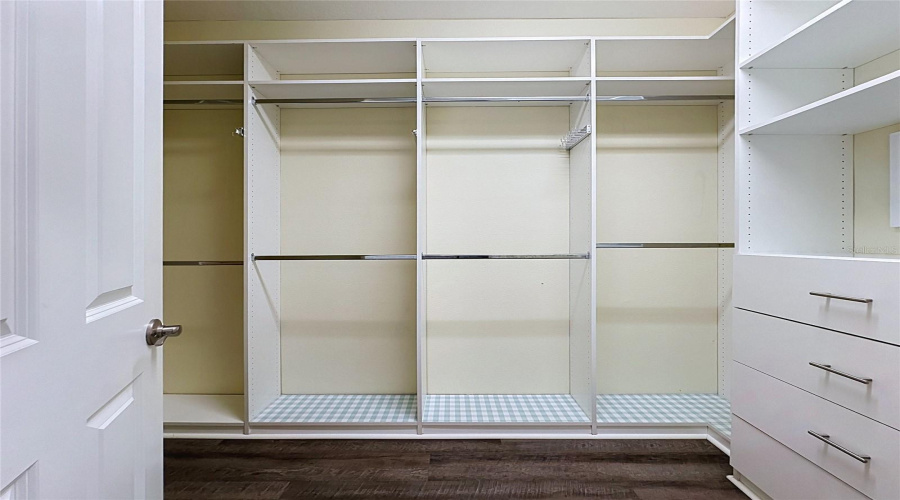 Built-In Closet System In The Primary Bedroom/Bathroom