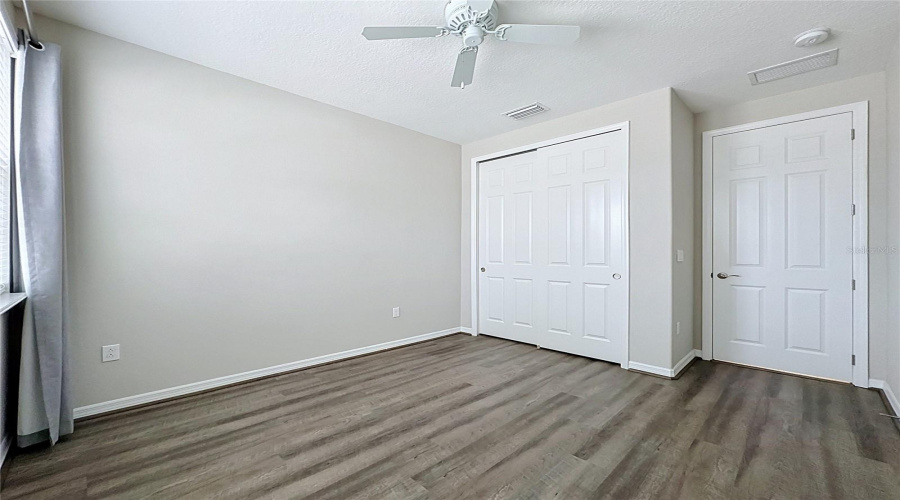 Entrance And Closet In Guest Bedroom