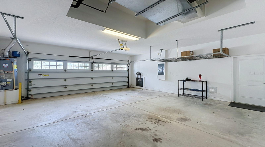 2 Car Garage Offers Overhead Storage Racks