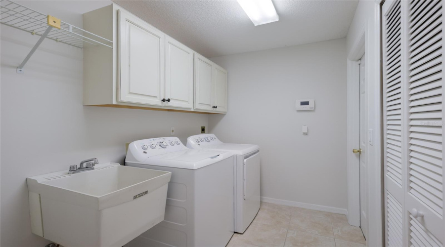 Laundry Room Between Kitchen And Garage.