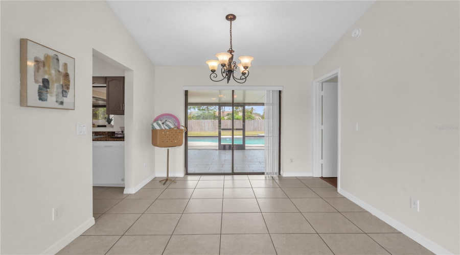 Dining Space Off Of Front Living And Sliding Doors To Take You To Outdoor Living