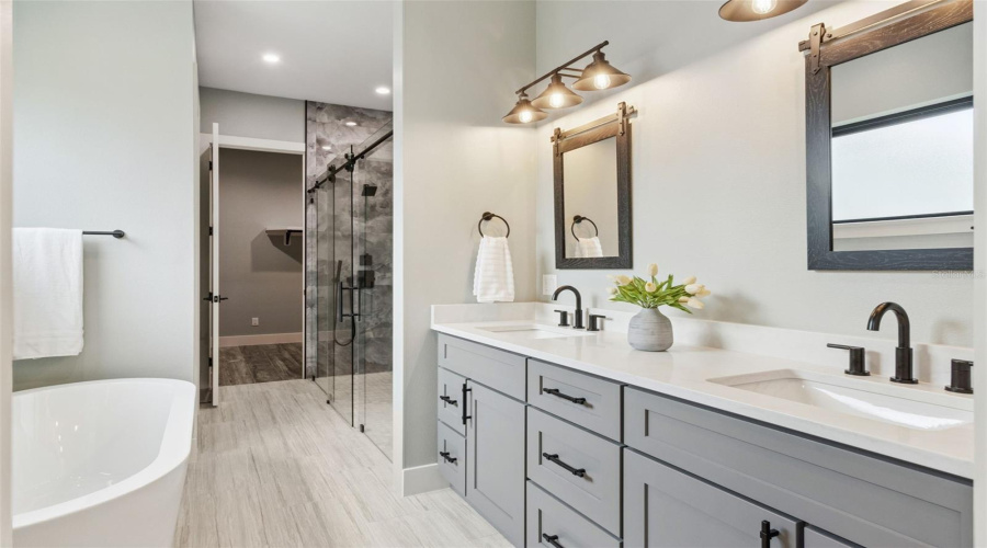 Luxury Primary Bathroom With Dual Vanity And Soaking Tub