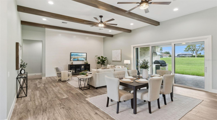 Open Concept Living And Dining Room With Golf Course Views