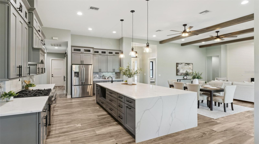 Open Chef'S Kitchen With Oversized Island And Luxury Finishes