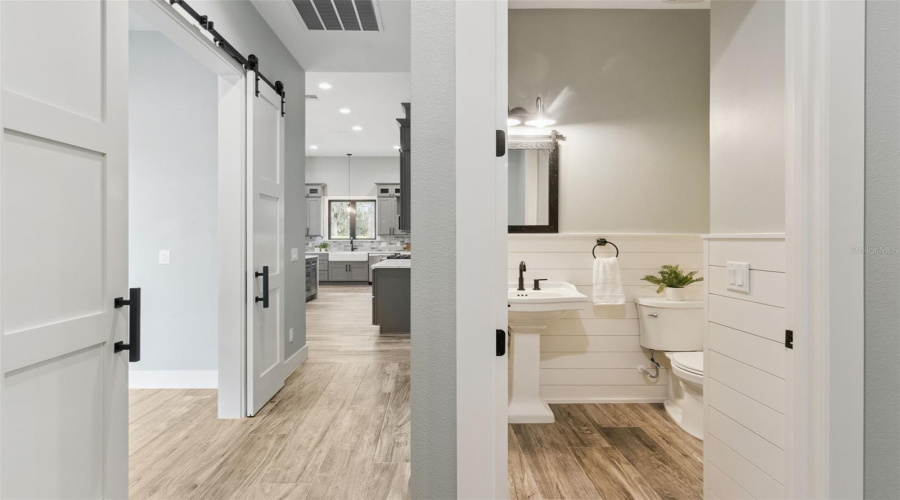 Hallway Leading To Primary Bedroom And Bath