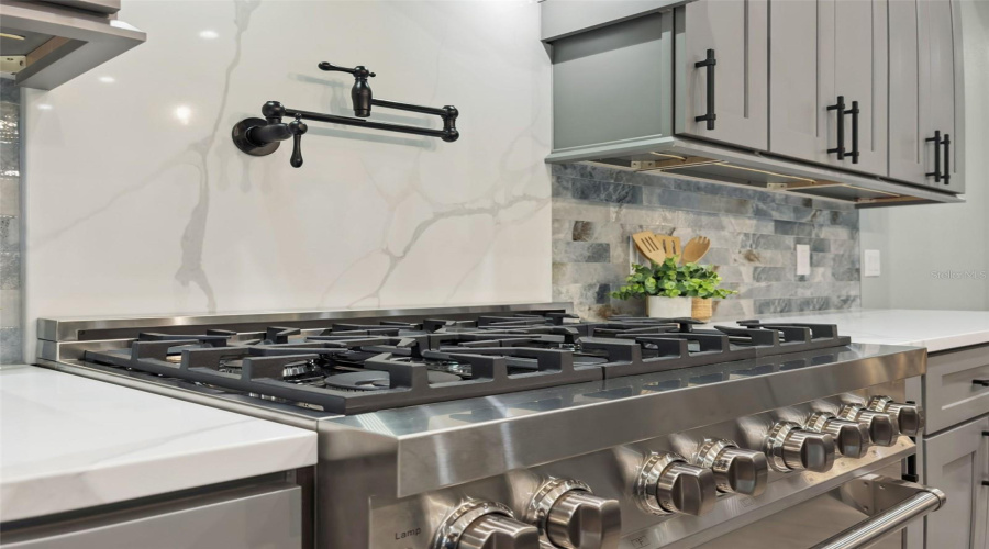 Professional Dual Fuel Range With Designer Backsplash