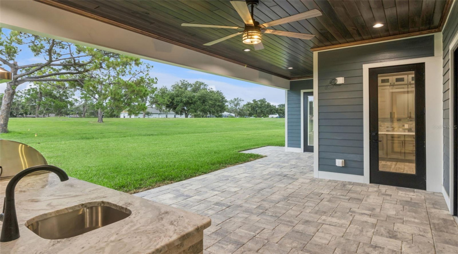 Outdoor Living Area With Panoramic Golf Course Views