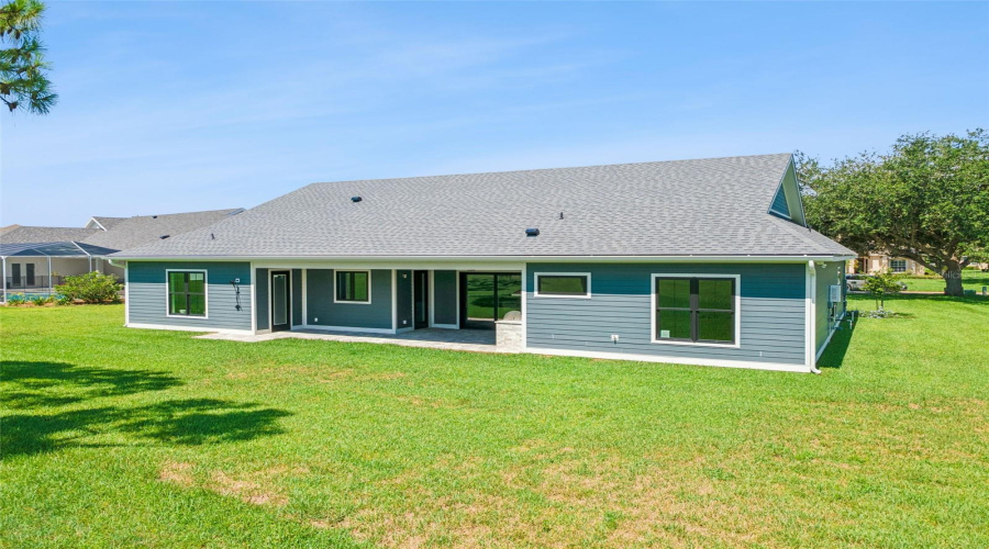 Covered Lanai And Spacious Backyard